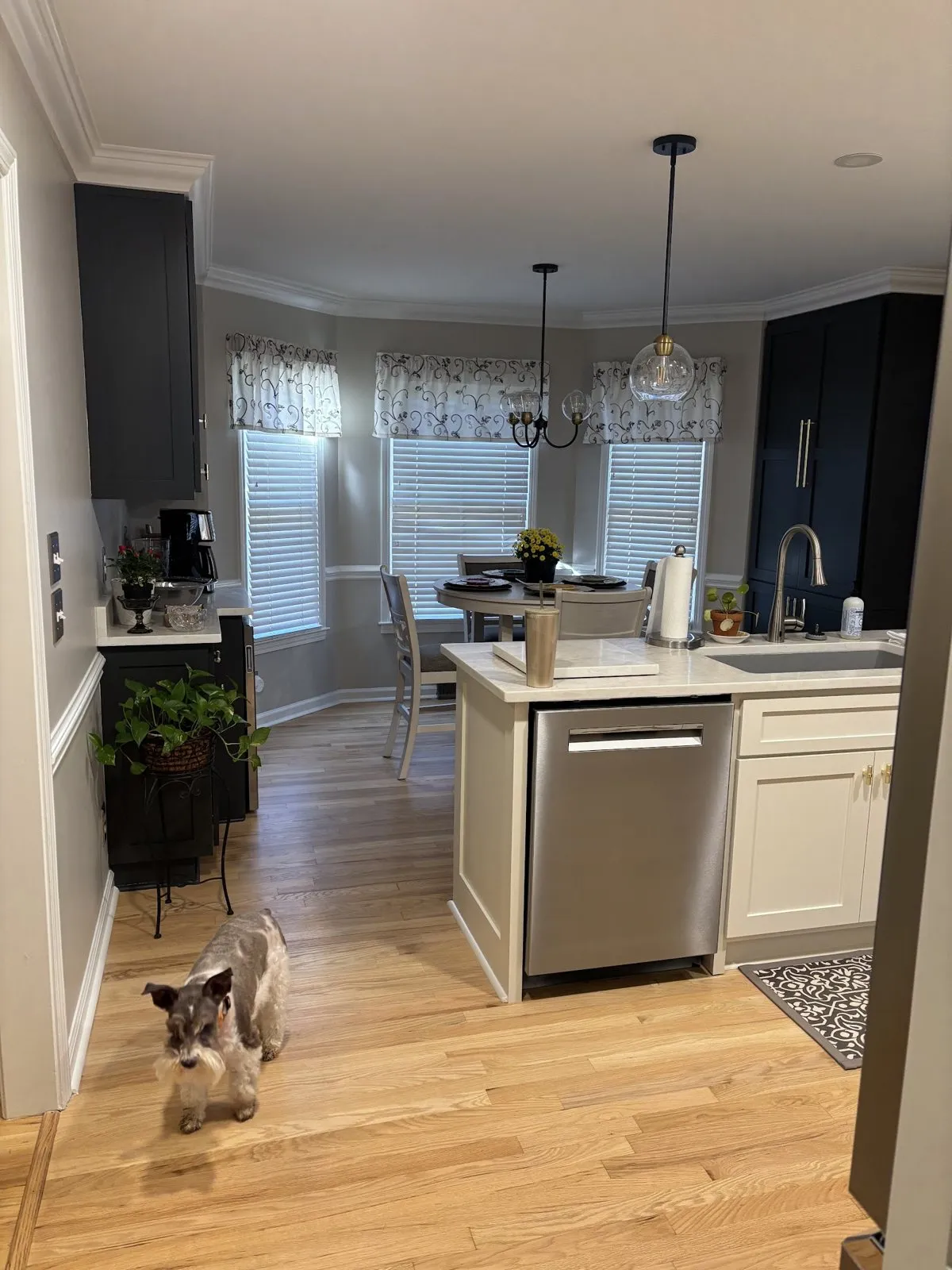 After: refinished natural oak through the kitchen and breakfast area